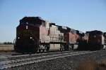 Stack train rolls west meeting another stack train